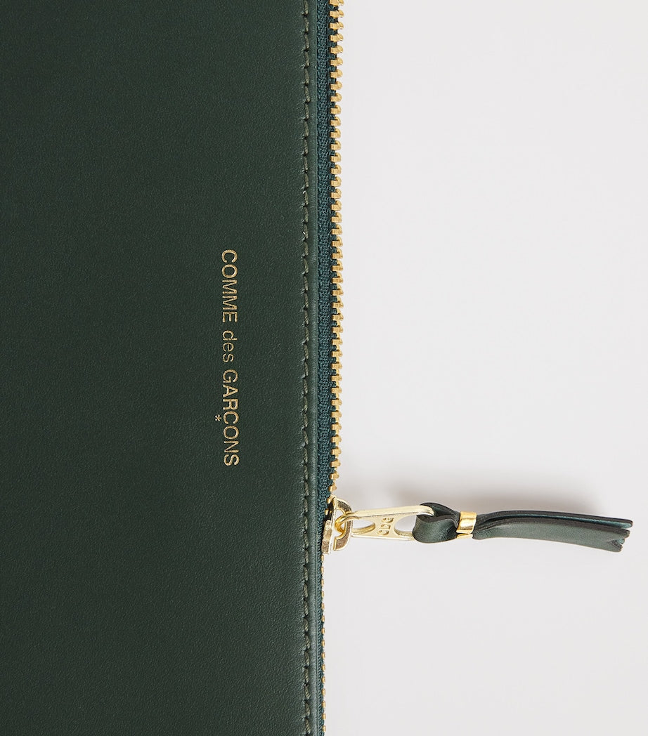 Comme des Garçons large leather pouch, imported from the UK