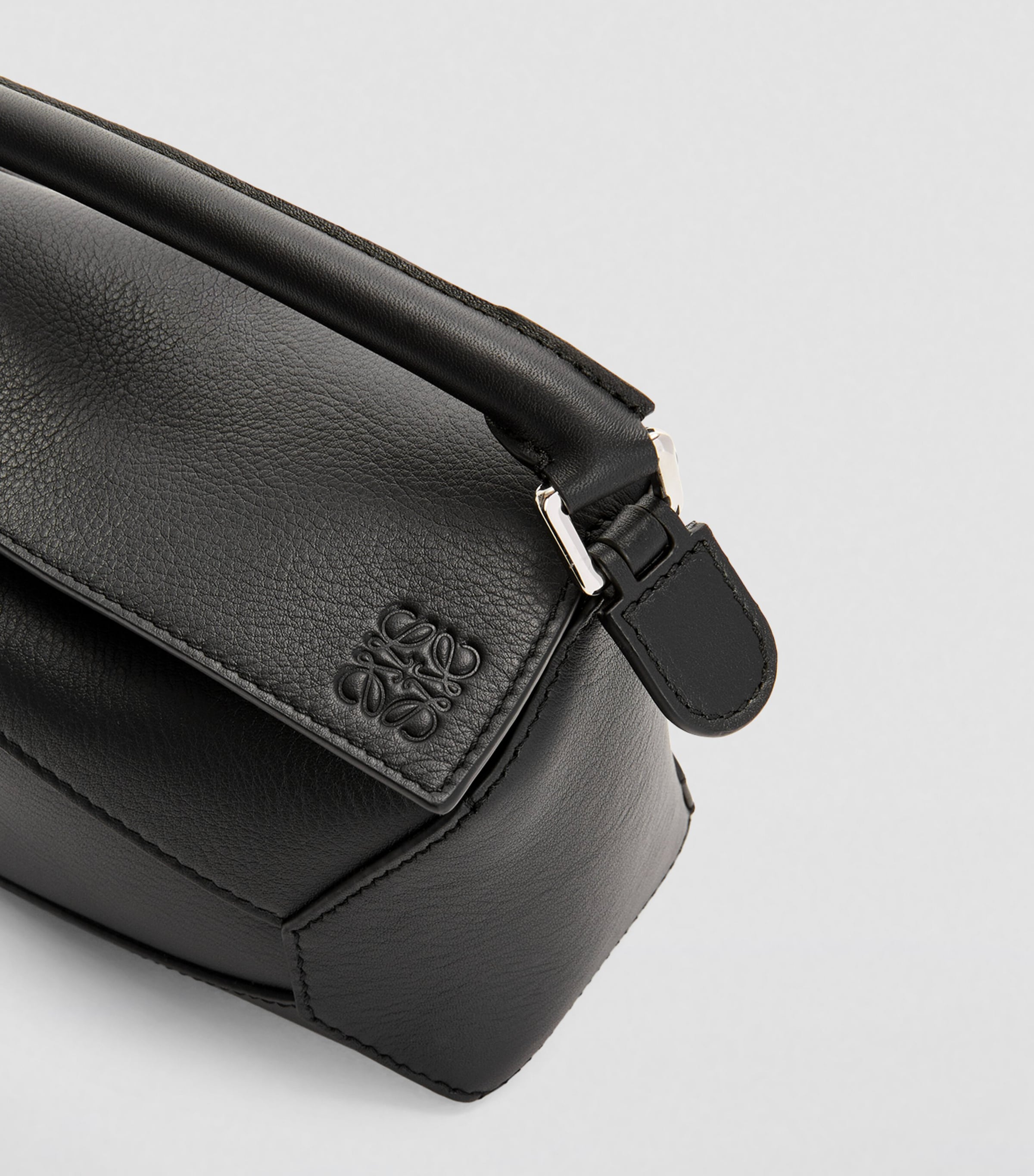 LOEWE mini Puzzle Edge top-handle bag in calfskin, imported from the UK