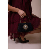 SVNX black ruched clutch bag with chain strap, UK version