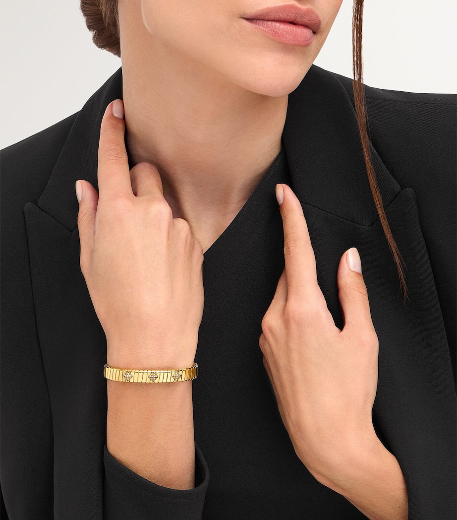 Bvlgari yellow gold Tubogas bangle with diamonds (British brand)