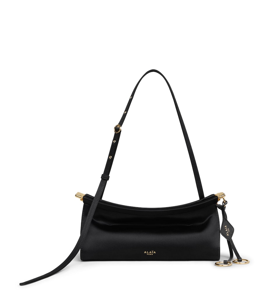 Alaïa small satin Le Click shoulder bag - British product