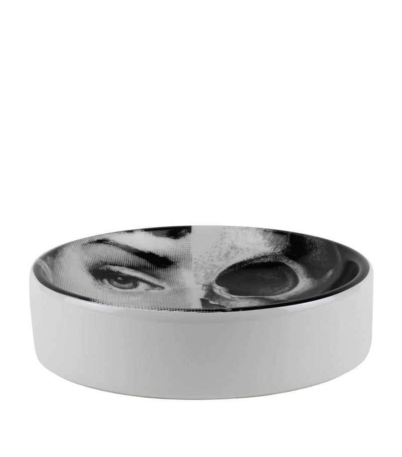 Fornasetti ashtray with face and skull design, number 288, approx. 3.5cm high and 13cm wide - British product