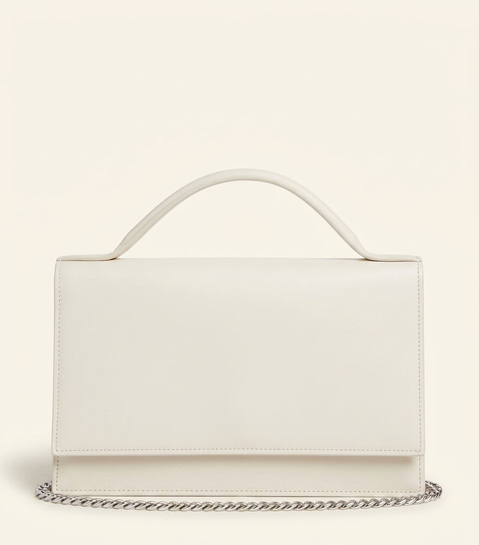 McQueen leather skull top-handle bag, imported from the UK