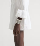 Givenchy tape cuff bracelet with distressed brass finish, imported from the UK