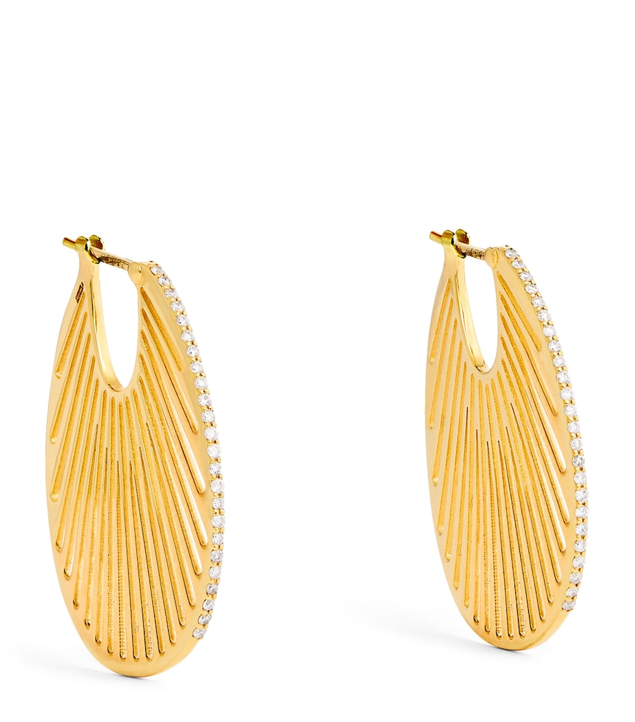 L'Atelier Nawbar Cosmic Rays earrings in 18kt yellow gold - British product