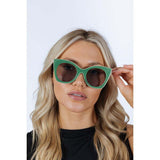 SVNX oversized cat-eye sunglasses in green, UK version