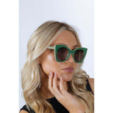 SVNX oversized cat-eye sunglasses in green, UK version