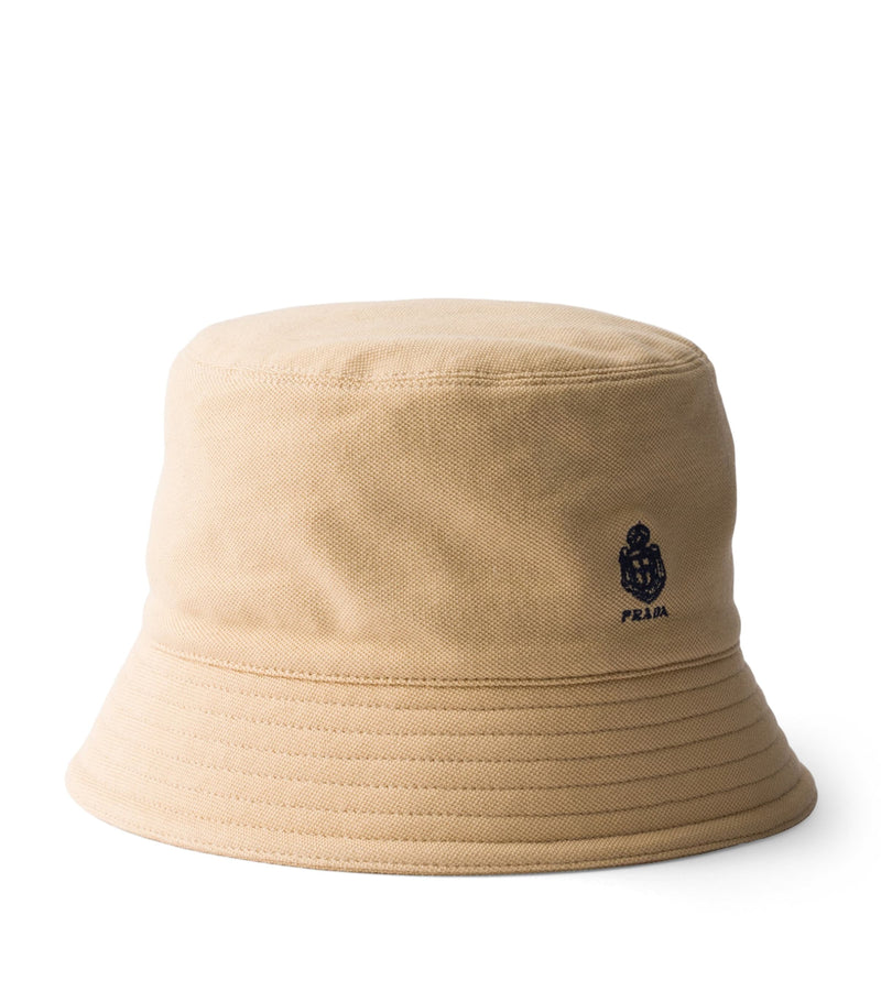 Prada cotton bucket hat with embroidered crest (British brand)