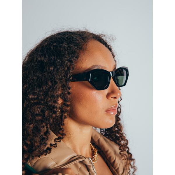 SVNX black angular cat-eye sunglasses, imported from the UK
