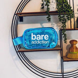 Bare Addiction gift set with toiletry bag, scrubber and headband (British brand)