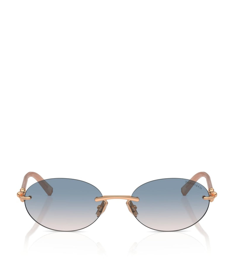 Tiffany & Co. rimless oval sunglasses with gold-tone temples, UK version