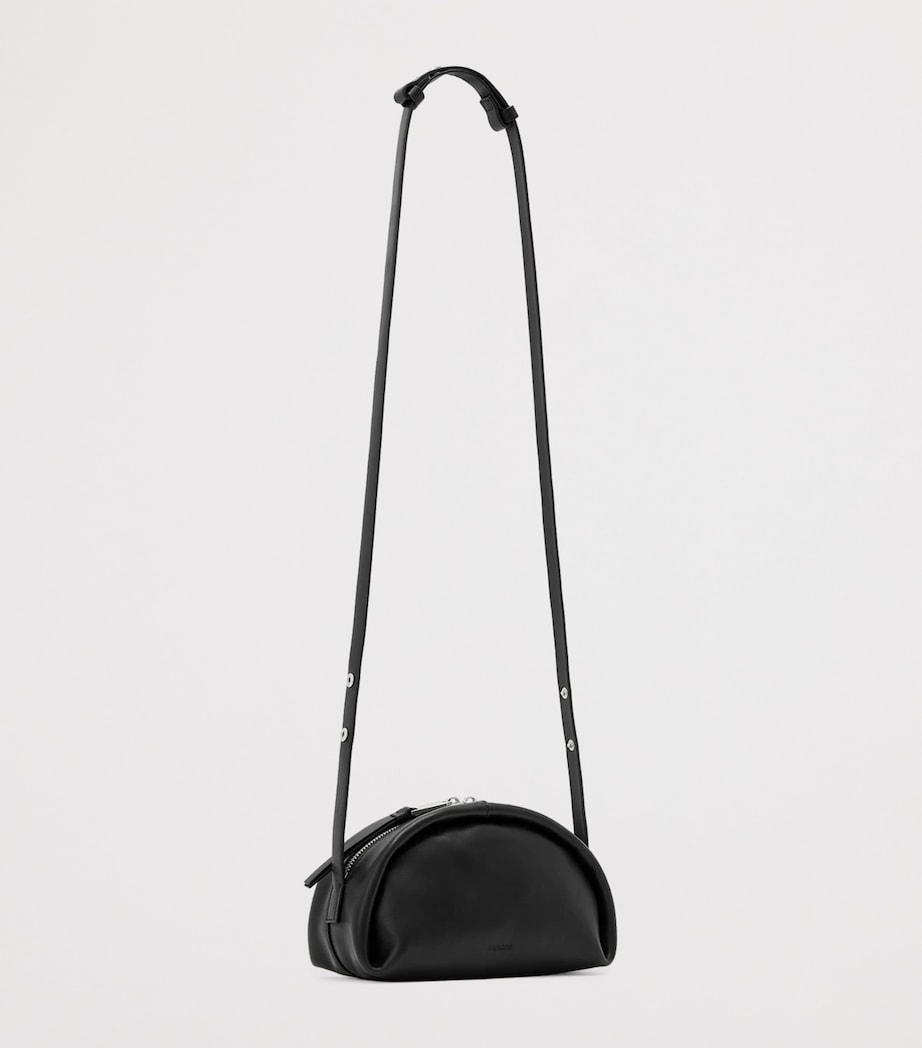 AllSaints Rosalie Arc cross-body bag in calfskin leather, imported from the UK