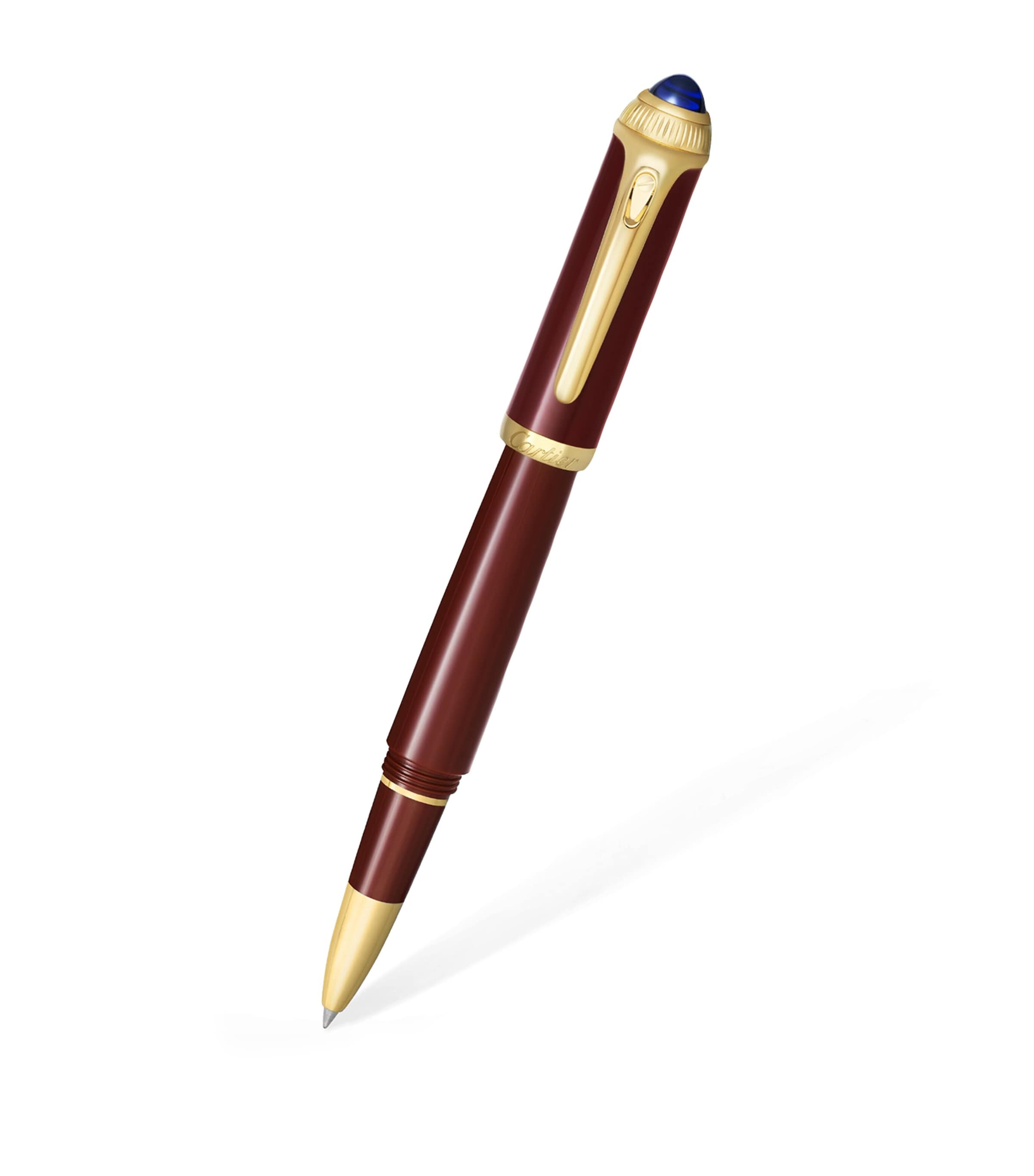 Cartier composite rollerball pen with gold-tone details and blue resin cabochon, 15cm length - British product