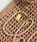 Chloé handwoven banana tote bag with gold charm, imported from the UK
