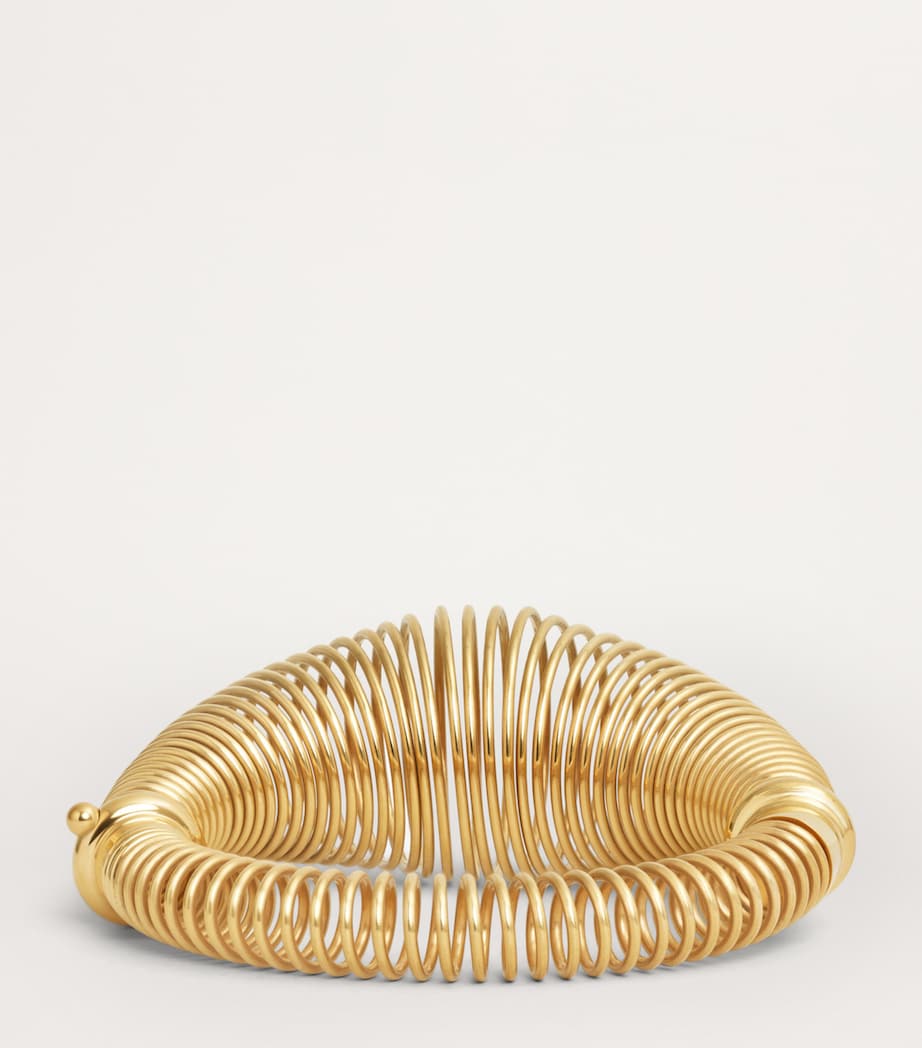 Alaïa gold-tone spiral bracelet stainless steel (British brand)