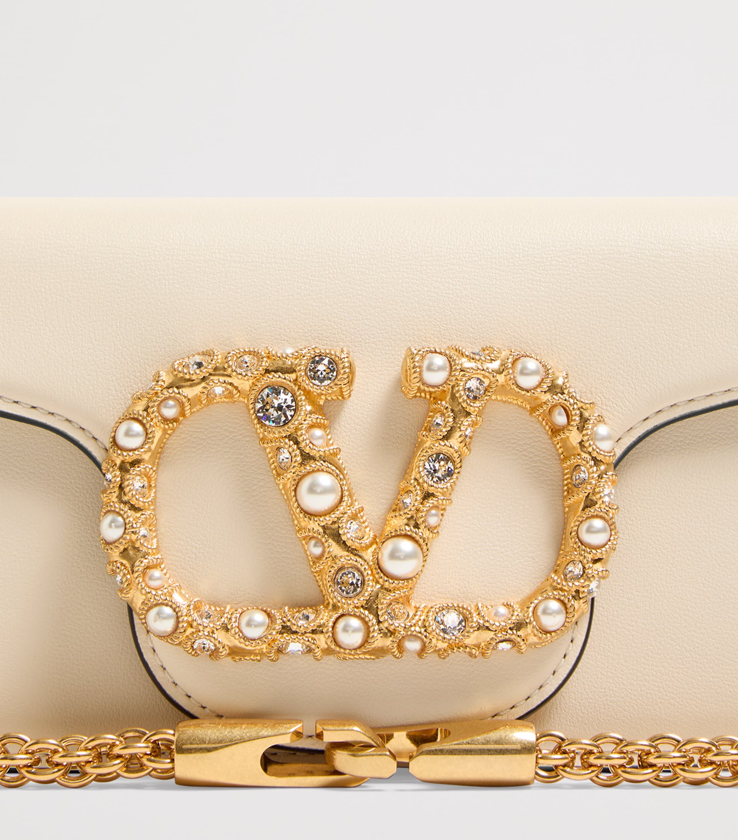 Valentino Garavani Small Embellished Locò shoulder bag, imported from the UK