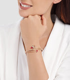 Bvlgari Fiorever bangle in rose gold with diamonds and rubellites (British brand)