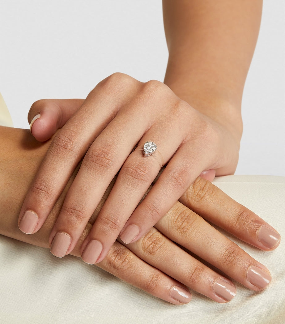 Persée white gold diamond floating ring (British brand)