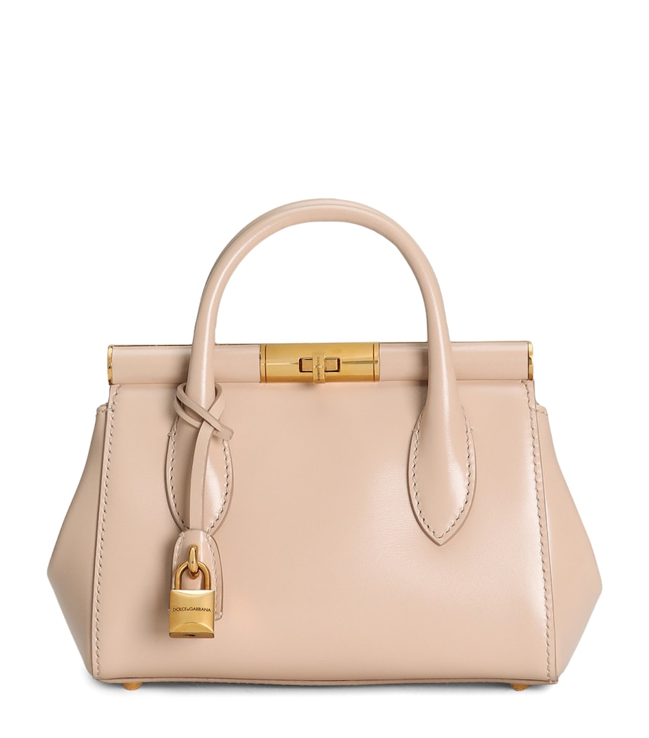 Dolce&Gabbana leather top-handle bag with gold-tone hardware, imported from the UK
