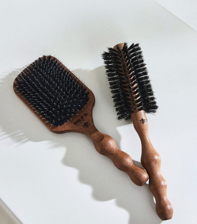 Philip B mahogany paddle hairbrush with natural boar and nylon bristles, imported from the UK
