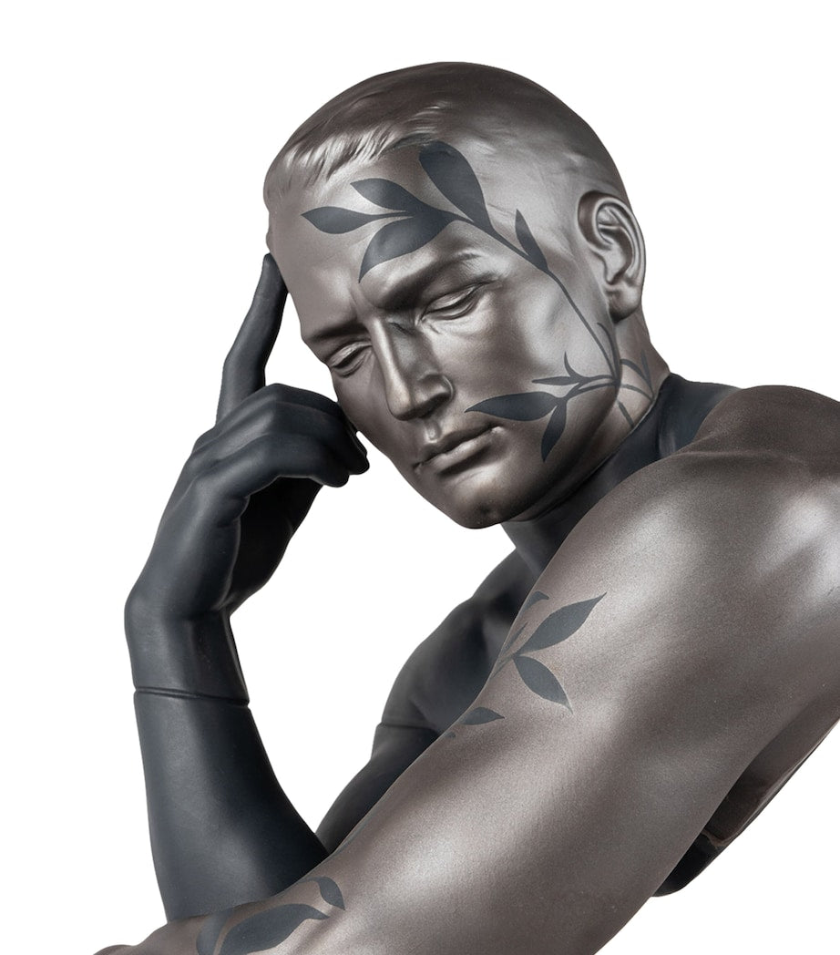 Lladró Him porcelain figurine with metal accents, UK version