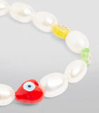 Nialaya smiley face beaded bracelet with pearls, imported from the UK