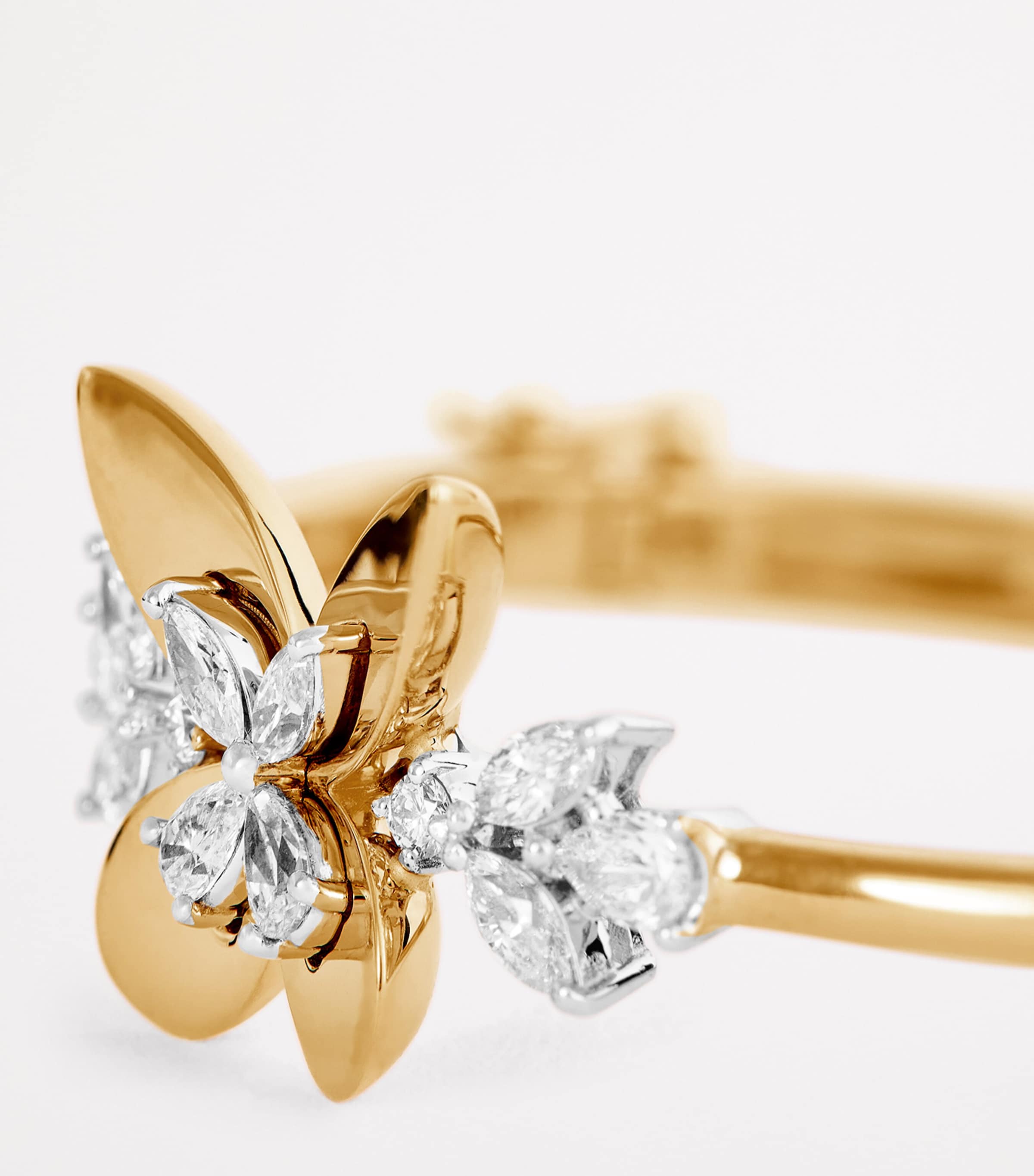 Yeprem yellow gold and diamond butterfly bangle (British brand)