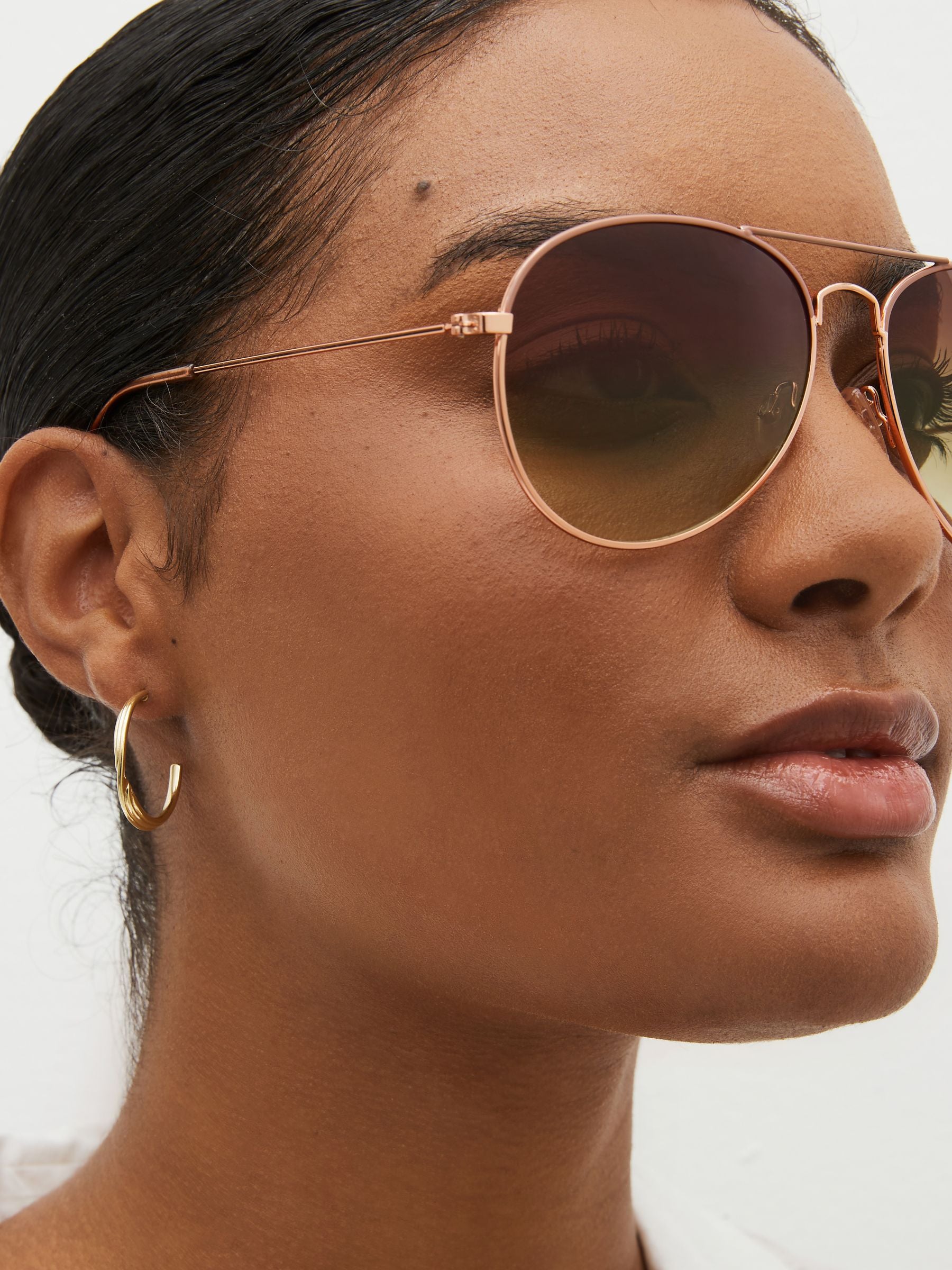 Rose gold classic aviator style sunglasses (British brand)