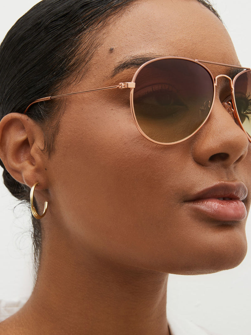 Rose gold classic aviator style sunglasses (British brand)