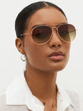 Rose gold classic aviator style sunglasses (British brand)