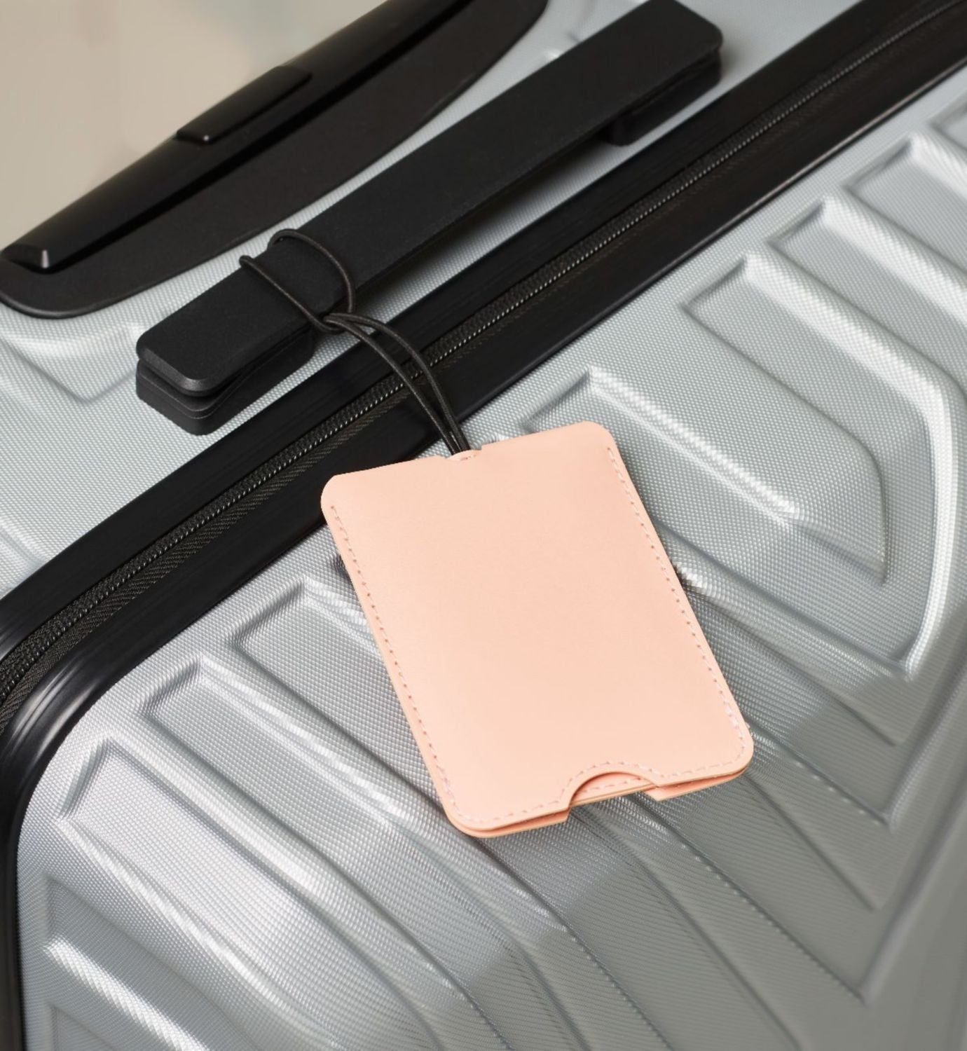 Boots luggage tag pull-out tab, UK version