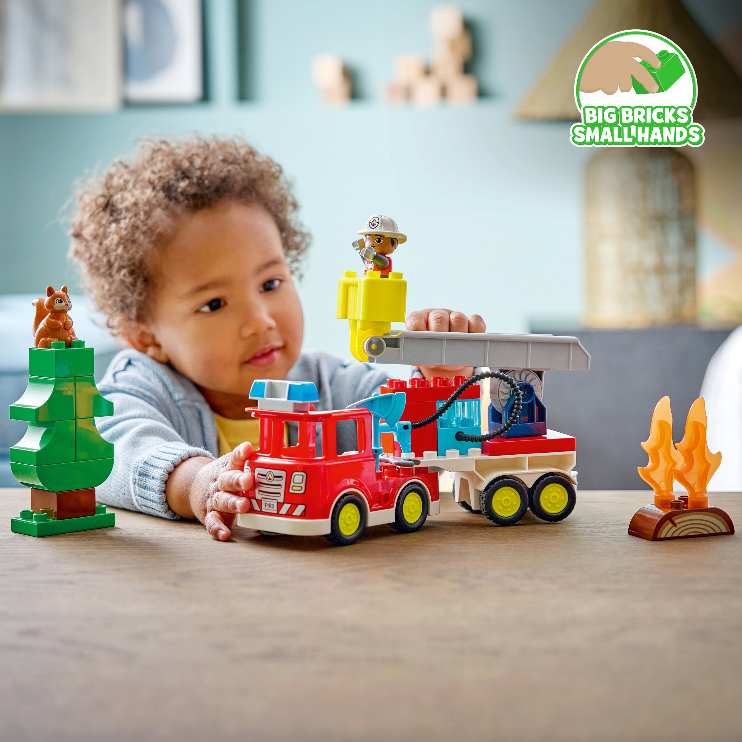 LEGO DUPLO fire truck with hose and firefighter, UK version