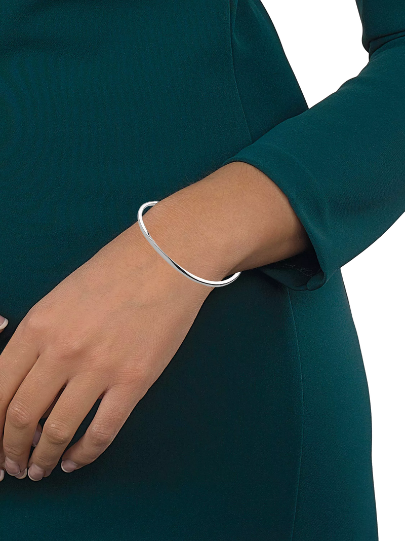Kit Heath silver bevel curve medium slim wave bangle, UK version