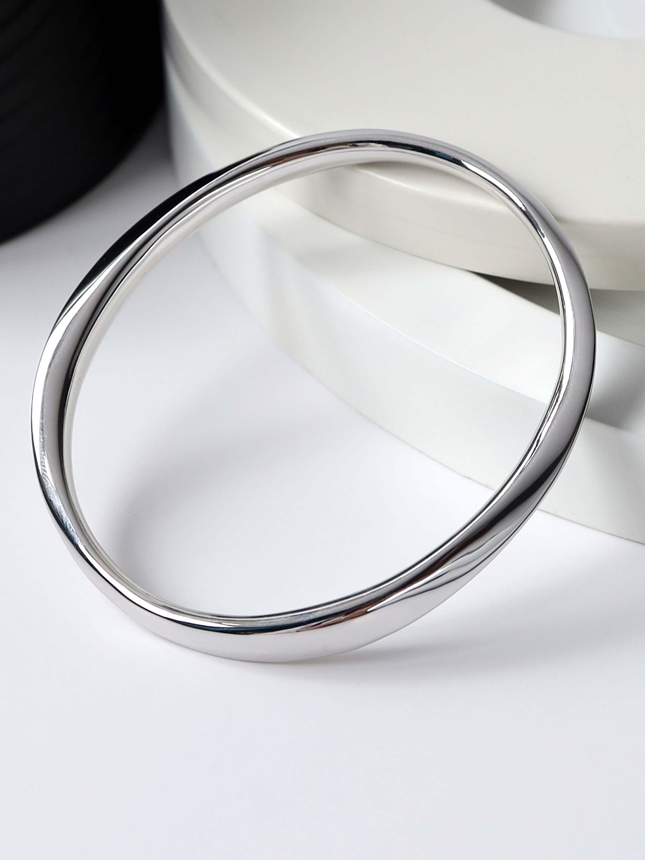 Kit Heath sterling silver Bevel Cirque bangle with classic design, UK version