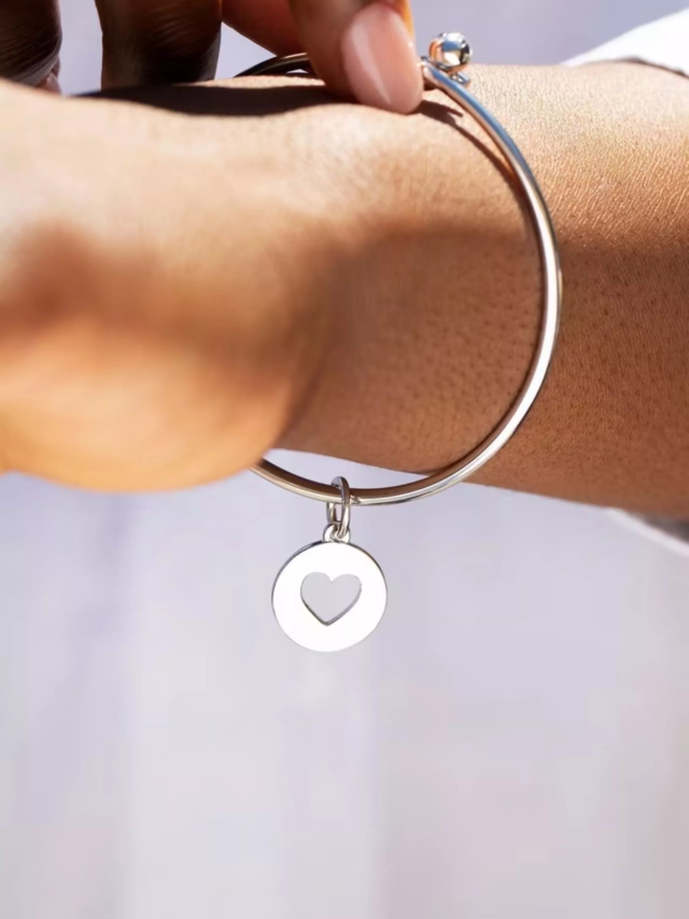 Recognised Heart Popon gold plated sterling silver bangle, UK version