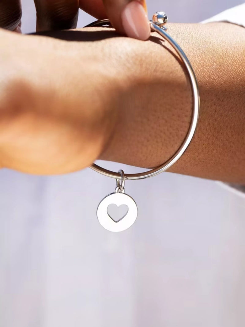 Recognised Heart Popon gold plated sterling silver bangle, UK version