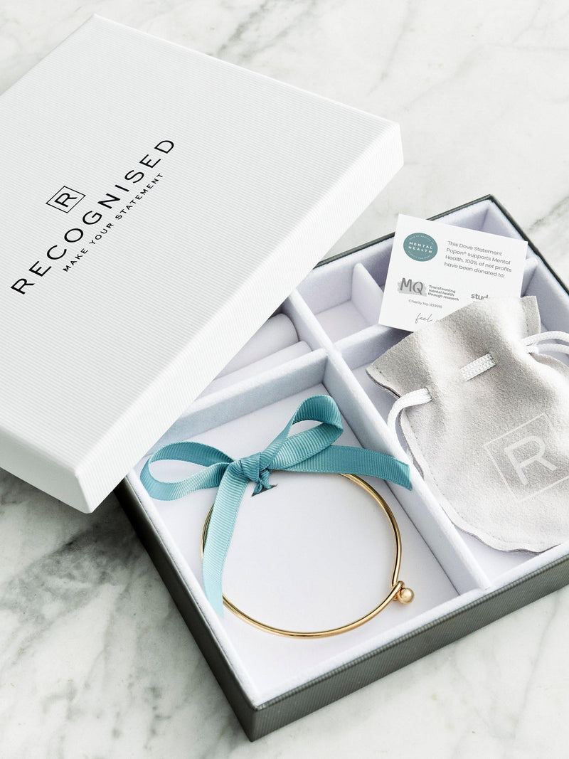 Recognised sterling silver dove bangle, imported from the UK