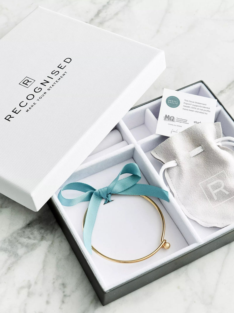 Recognised sterling silver dove bangle, imported from the UK