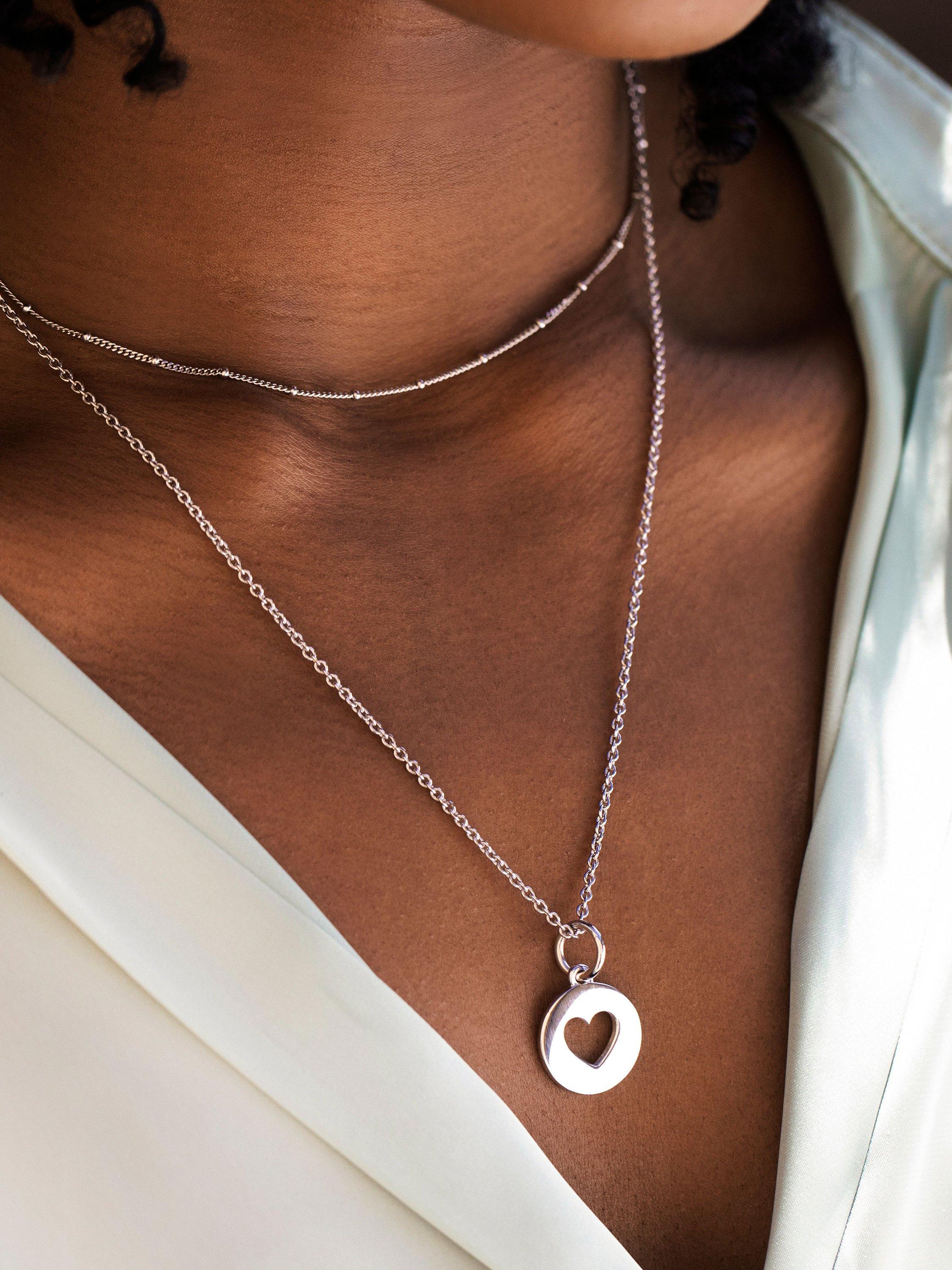 Recognised Heart Popon sterling silver pendant necklace, imported from the UK