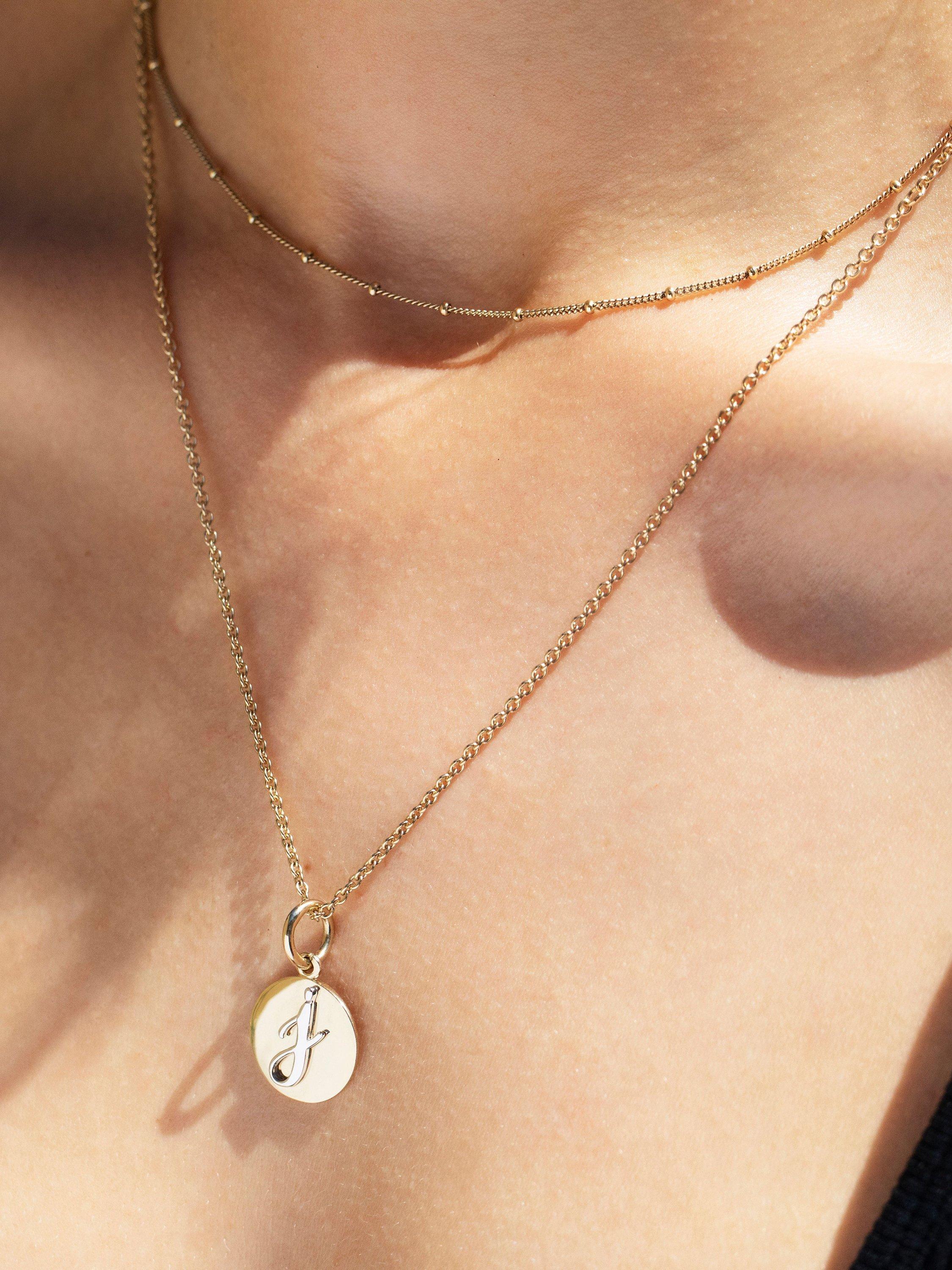 Recognised alphabet pendant necklace gold (British brand)