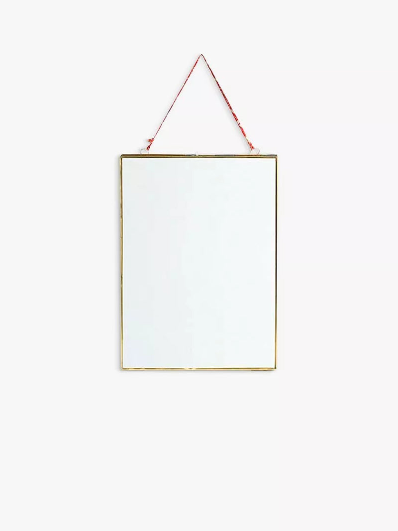 Nkuku Kiko glazed portrait frame in antique brass - British product