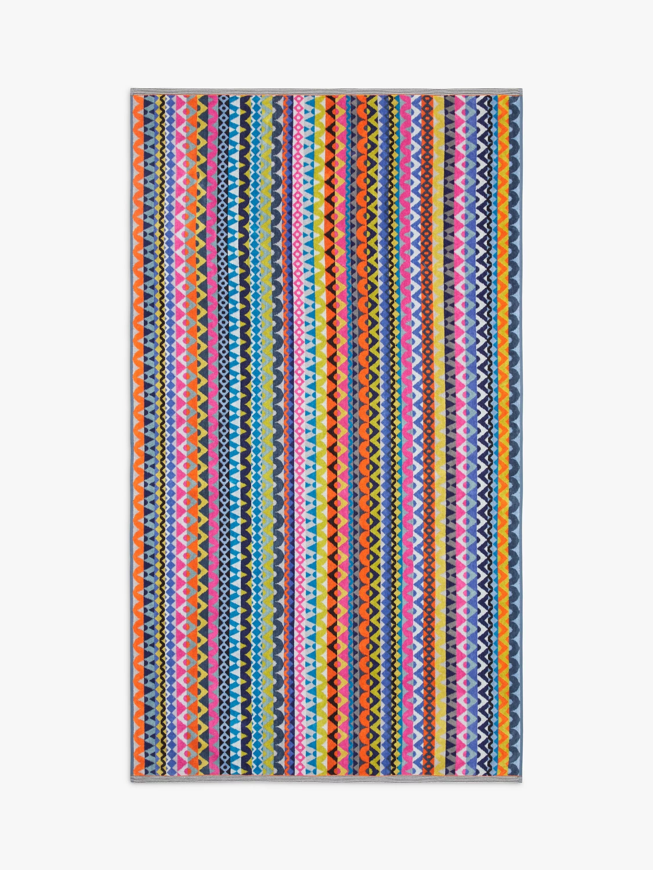 Margo Selby beach towel with red multi geometric pattern, imported from the UK