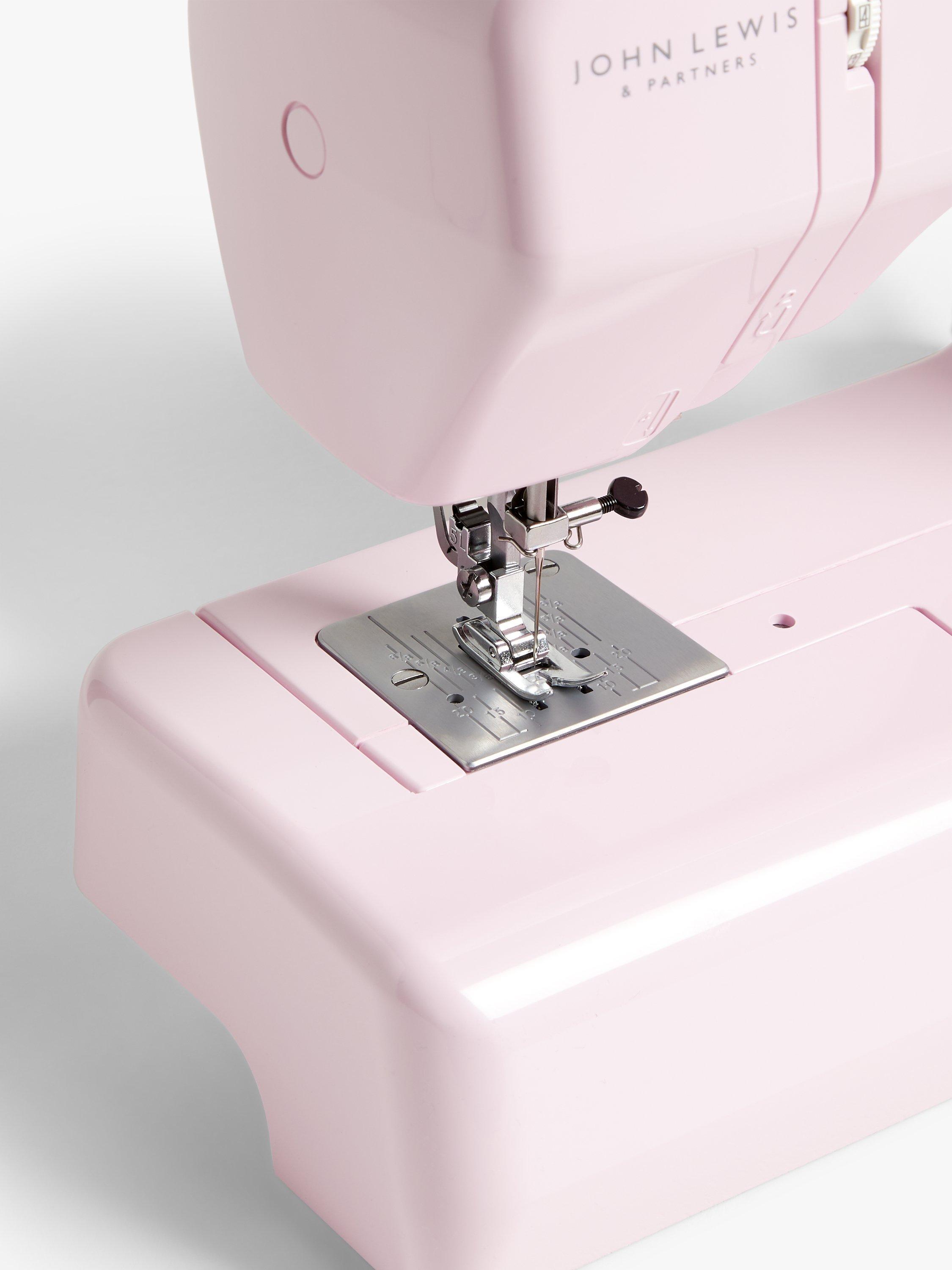 John Lewis sewing machine in soft pink with 14 stitch options, UK version