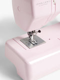 John Lewis sewing machine in soft pink with 14 stitch options, UK version