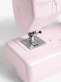 John Lewis sewing machine in soft pink with 14 stitch options, UK version