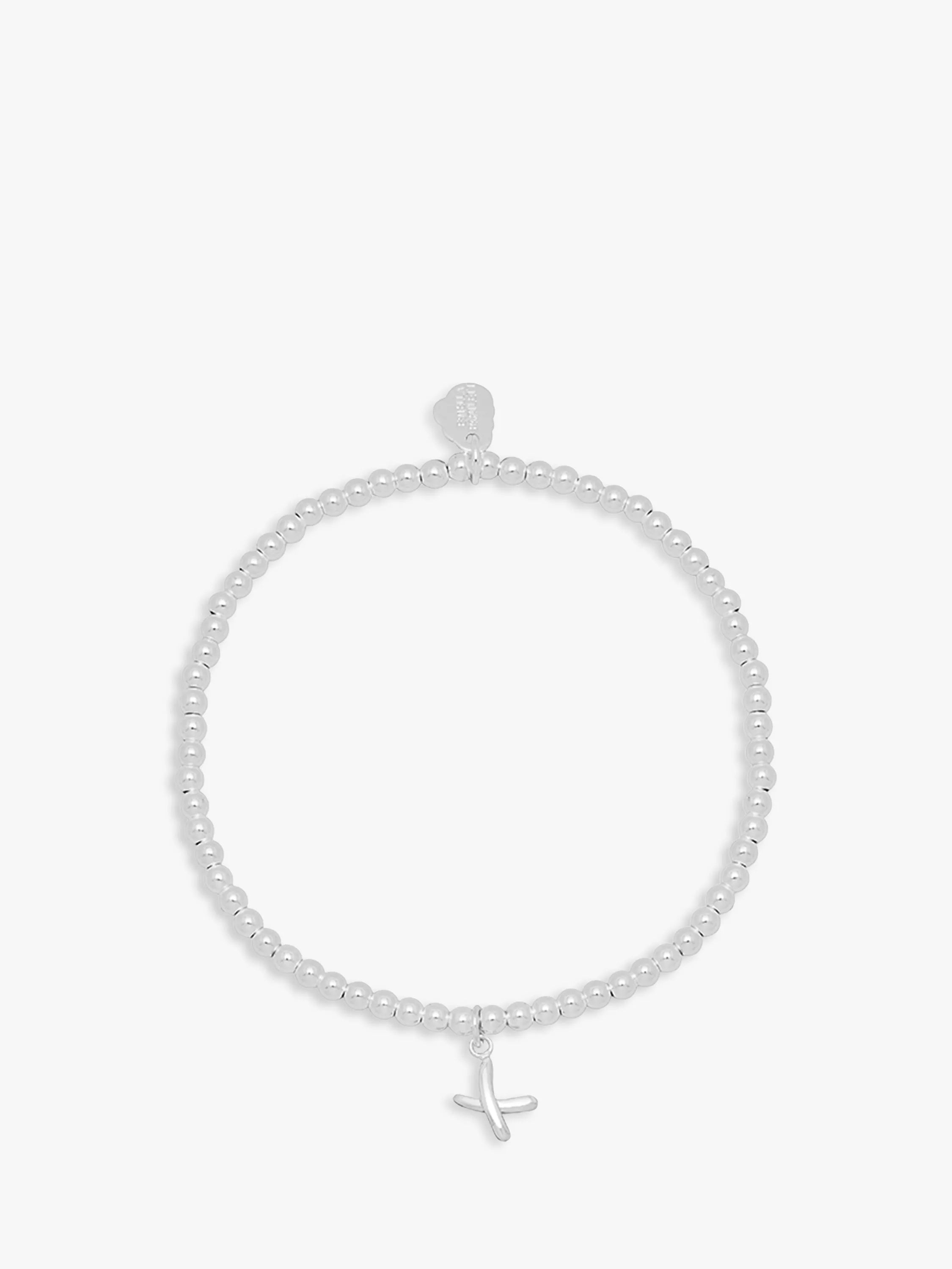 Estella Bartlett silver beaded kiss bracelet, imported from the UK