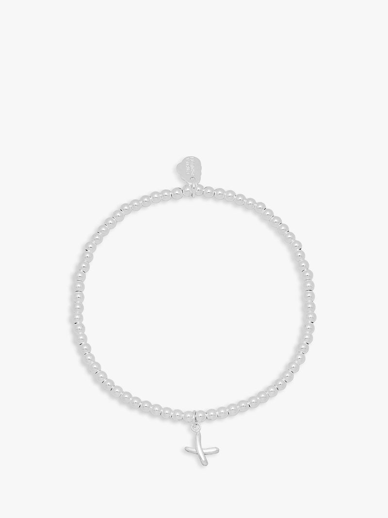 Estella Bartlett silver beaded kiss bracelet, imported from the UK