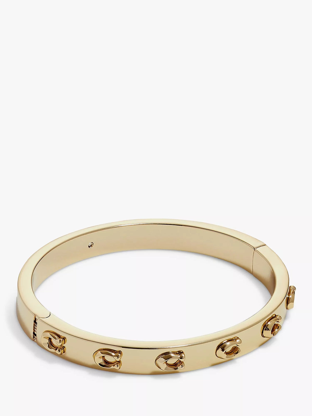 Coach C motif bangle gold toned brass, imported from the UK