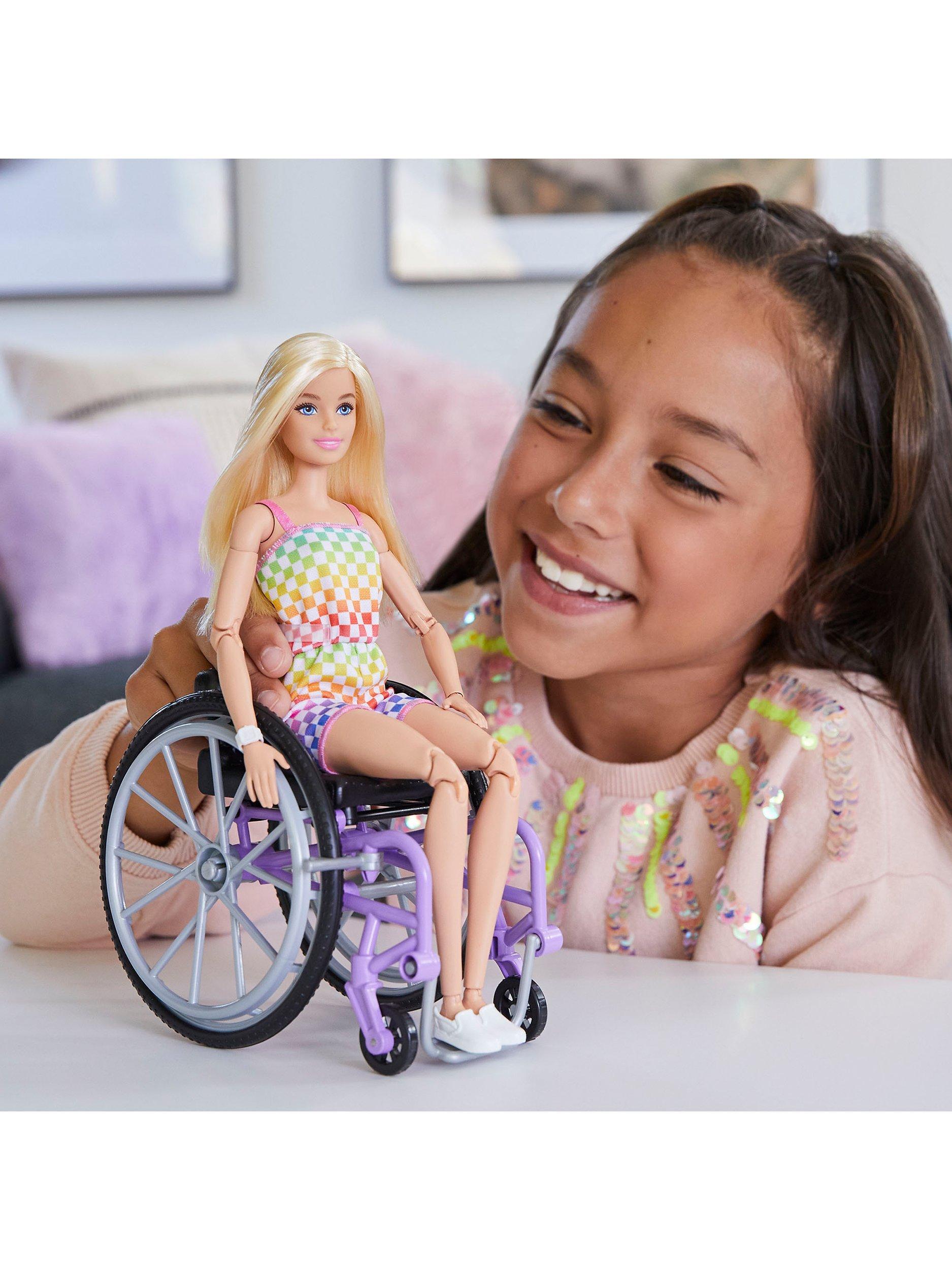 Barbie Fashionista doll in wheelchair with long hair, imported from the UK