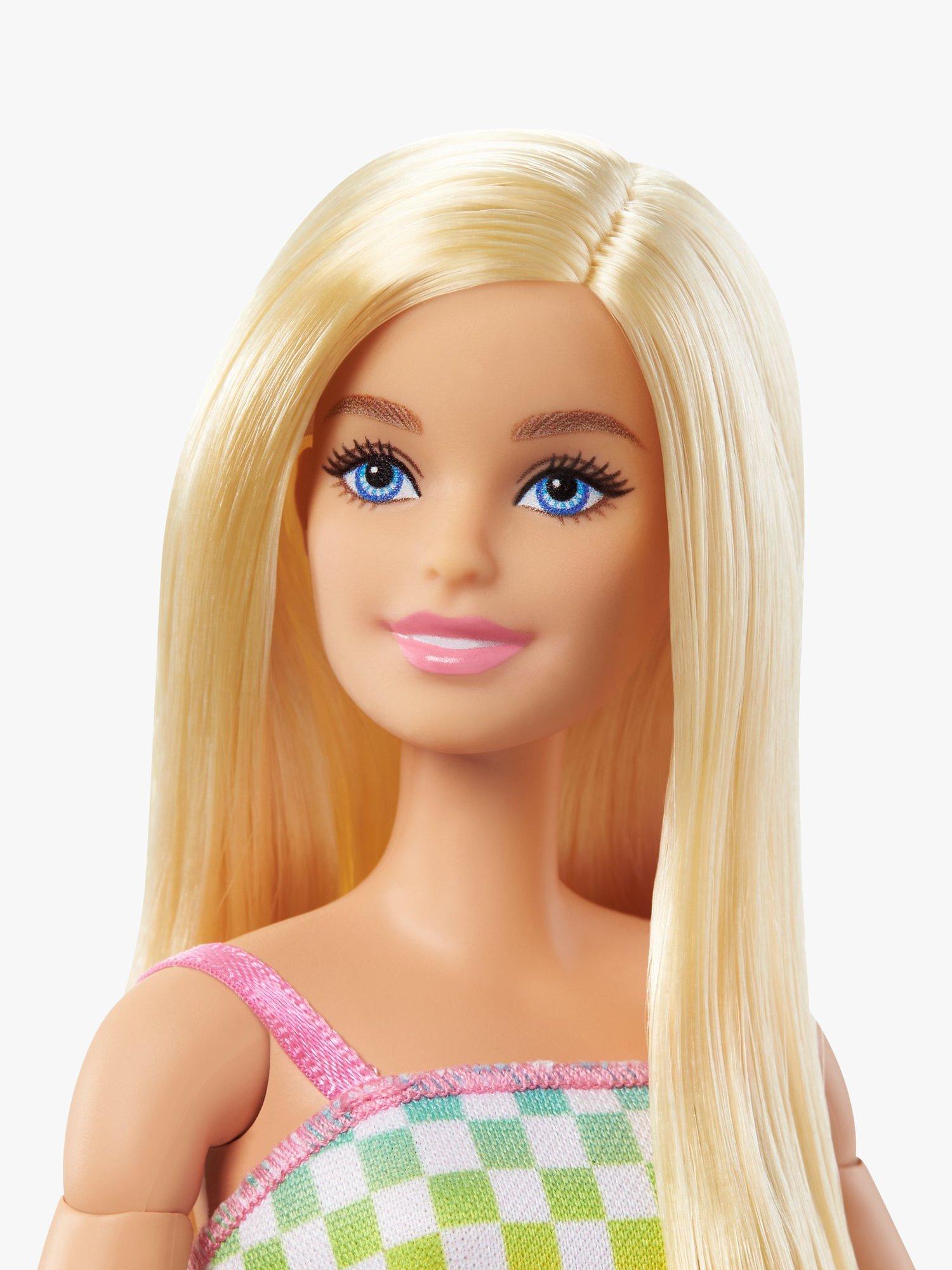 Barbie Fashionista doll in wheelchair with long hair, imported from the UK